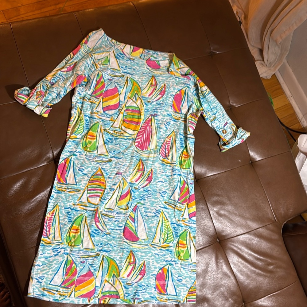 Lilly Pulitzer, 3/4 length sleeves with gold button detail, knee length